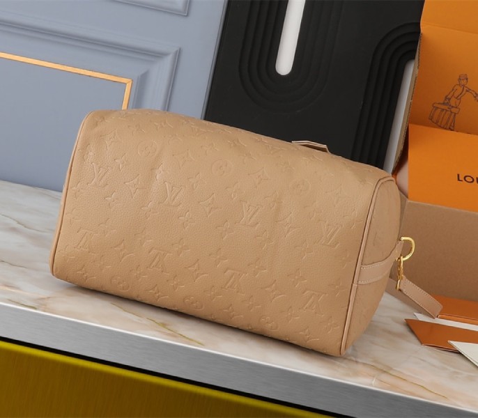 Louis Vuitton Monogram Empreinte Speedy Soft 30 Handbag In Apricot