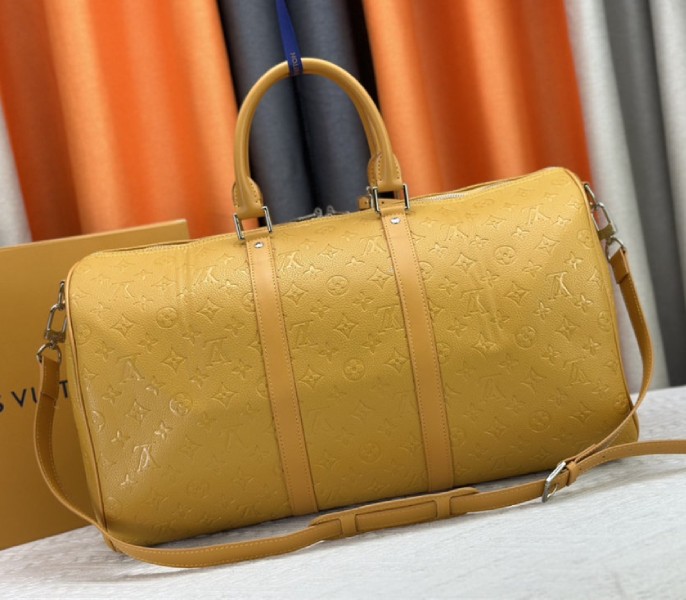 Louis Vuitton Taurillon Leather Keepall Bandouliere 50 In Safran Yellow