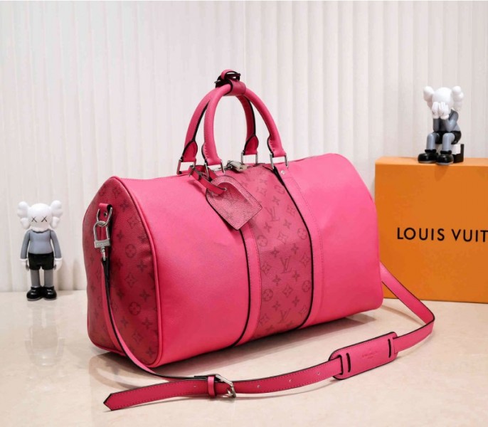 Louis Vuitton Taiga Leather Keepall Bandouliere 50 Travel Bag In Pink