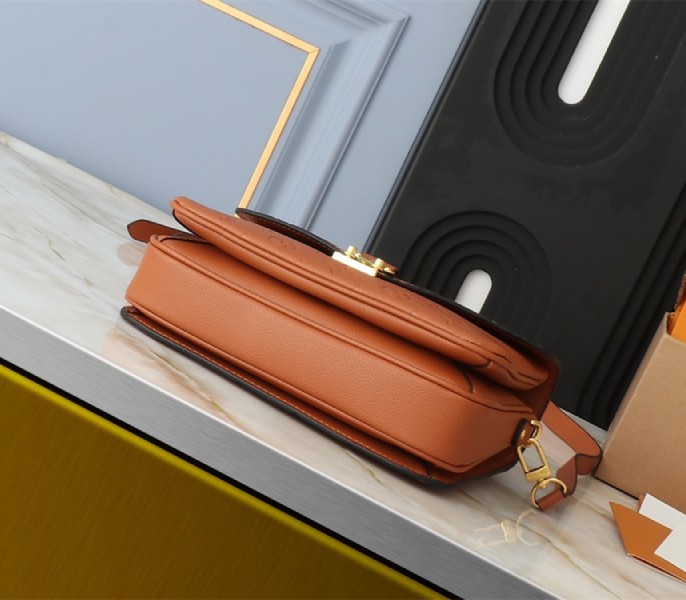 Louis Vuitton Monogram Empreinte Metis Handbag In Cognac Brown