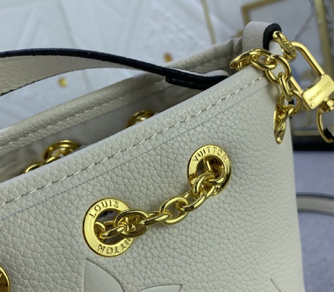 Louis Vuitton Monogram Empreinte Leather Bundle Bag In Cream