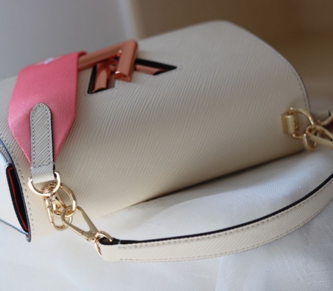 Louis Vuitton Epi Leather Twist MM Handbag In Quartz White With Gradient Strap