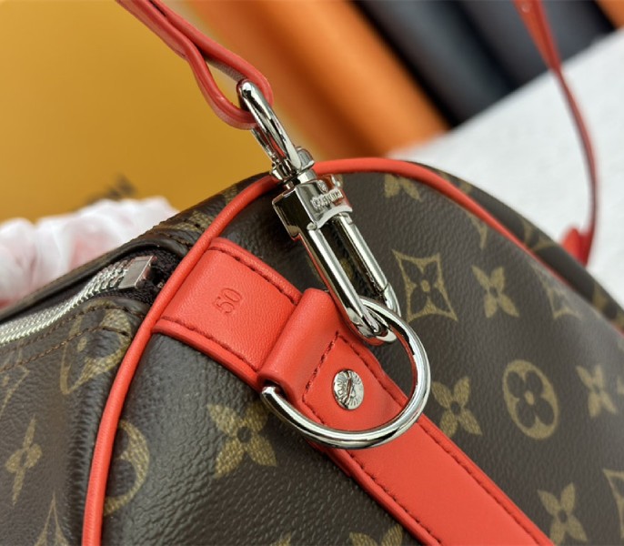 Louis Vuitton Monogram Macassar Canvas Keepall Bandouliere 50 In Red