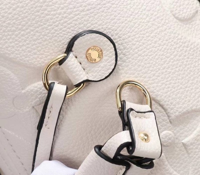 Louis Vuitton Monogram Empreinte Neverfull MM Tote In Cream