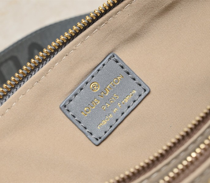Louis Vuitton Coussin PM Bag In Gray With Jacquard Strap