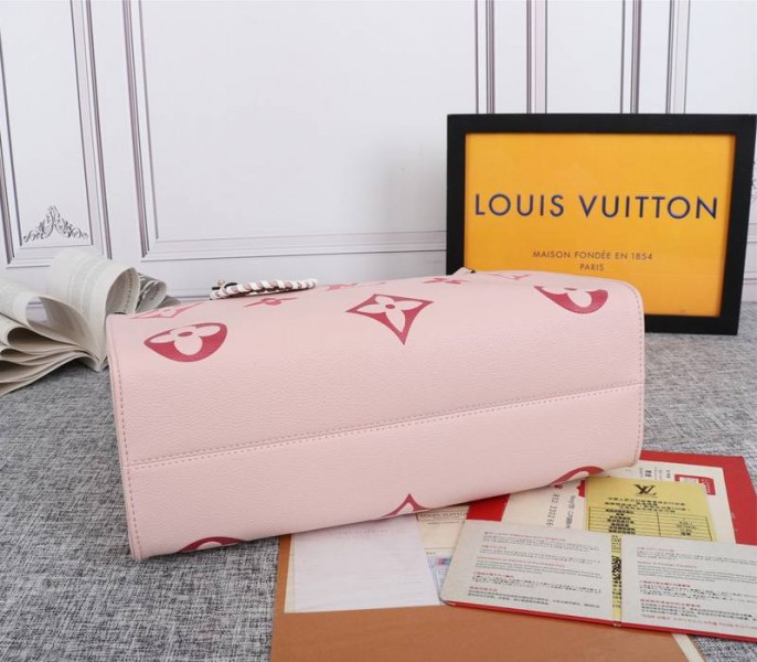 Louis Vuitton Monogram Empreinte Leather Onthego MM Bag In Pink