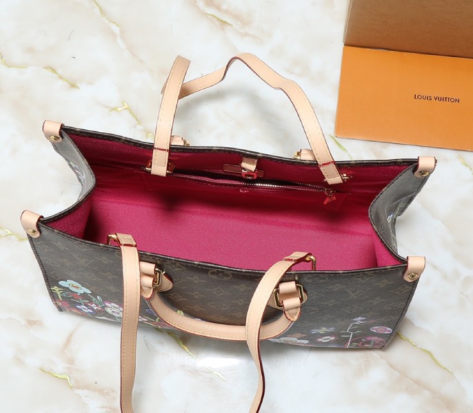 X TM Monogram Canvas Onthego MM