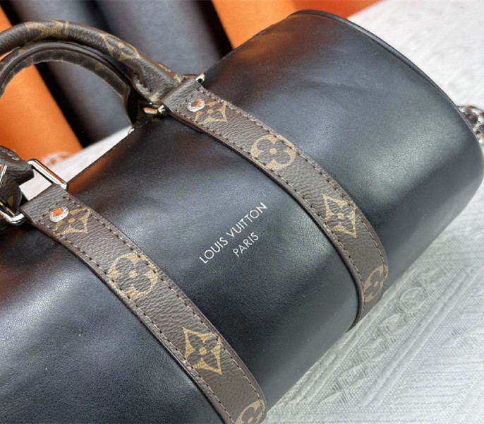 Louis Vuitton Vibe Keepall Bandouliere 25 In Black And Monogram Canvas