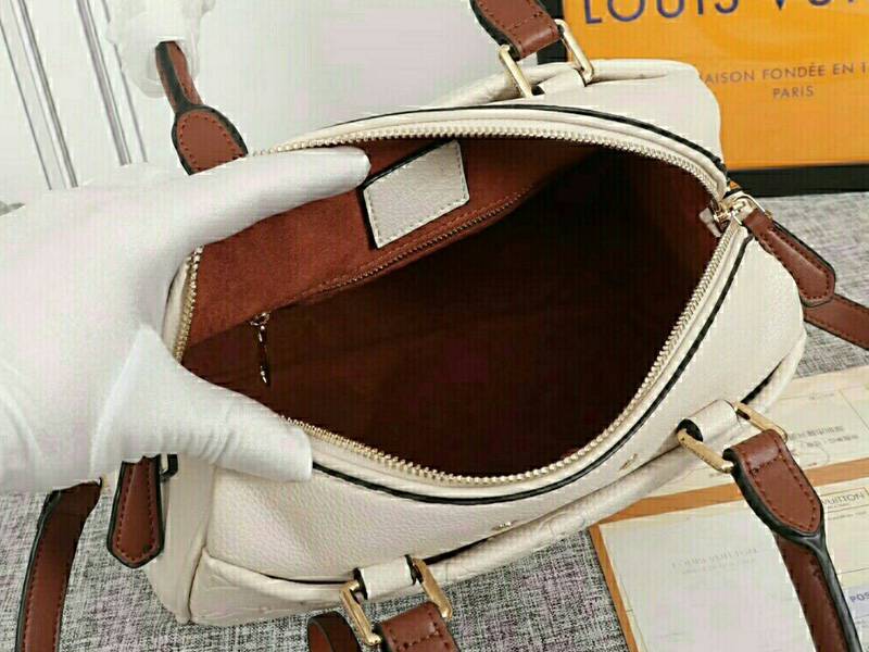 Louis Vuitton Monogram Empreinte Speedy Bandouliere 25 Handbag In Cream