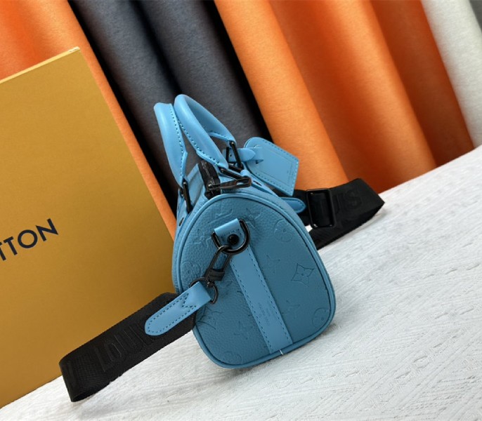 Louis Vuitton Taurillon Monogram Leather Keepall Bandouliere 25 In Turquoise