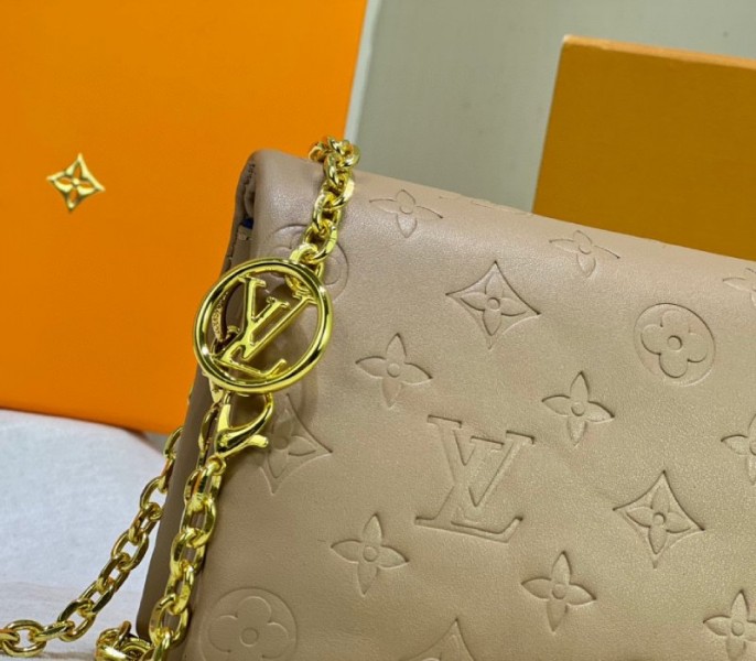Louis Vuitton Coussin Pochette In Camel