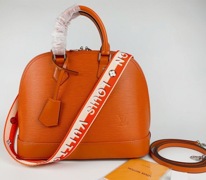 Louis Vuitton Epi Leather Alma PM Handbag In Orange With Jacquard Strap