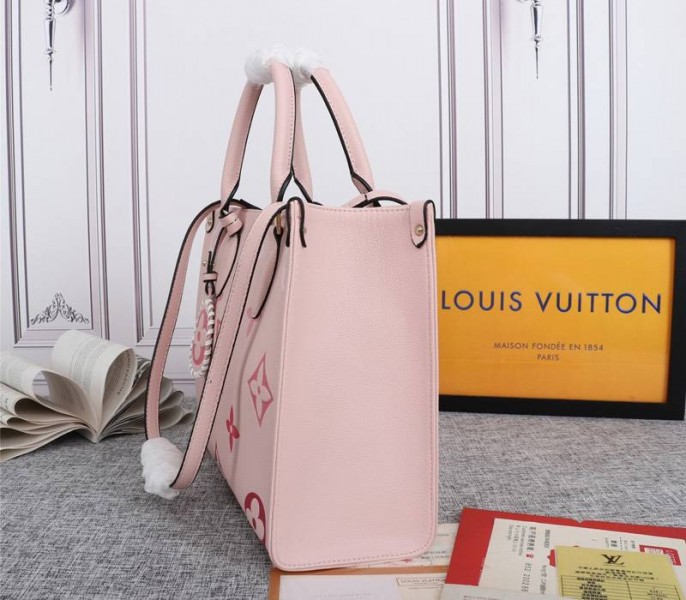 Louis Vuitton Monogram Empreinte Leather Onthego MM Bag In Pink