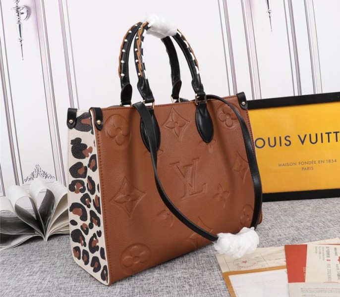 Louis Vuitton Monogram Empreinte Wild At Heart Onthego MM Tote In Caramel Brown