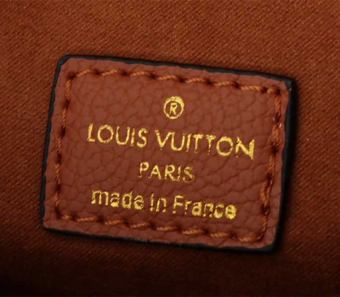 Louis Vuitton Monogram Empreinte Metis Handbag In Cognac Brown