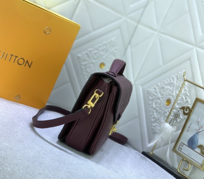 Monogram Empreinte Leather Metis In Wine