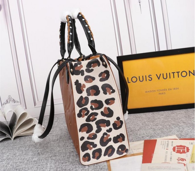Louis Vuitton Monogram Empreinte Wild At Heart Onthego MM Tote In Caramel Brown