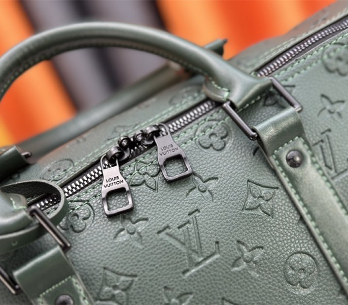 Louis Vuitton Taurillon Leather Keepall Bandouliere 50 In Borneo Green