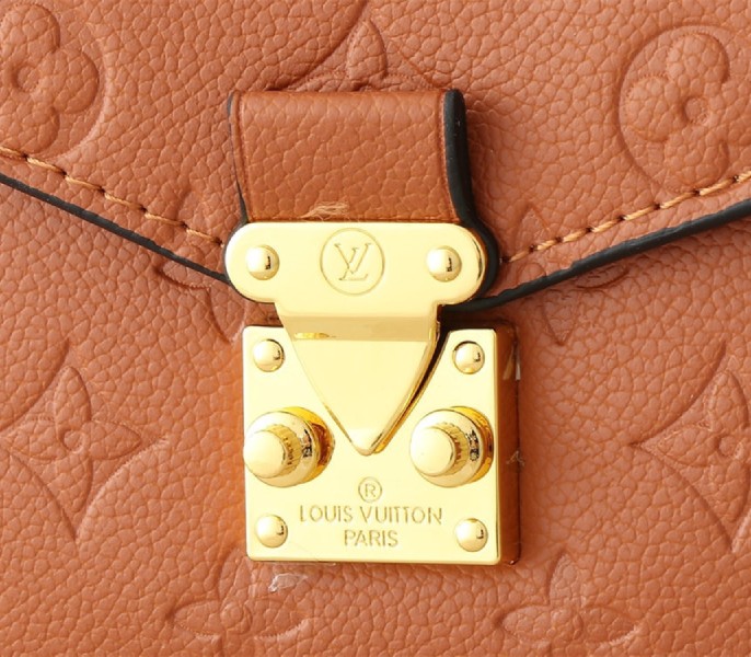 Louis Vuitton Monogram Empreinte Metis Handbag In Cognac Brown