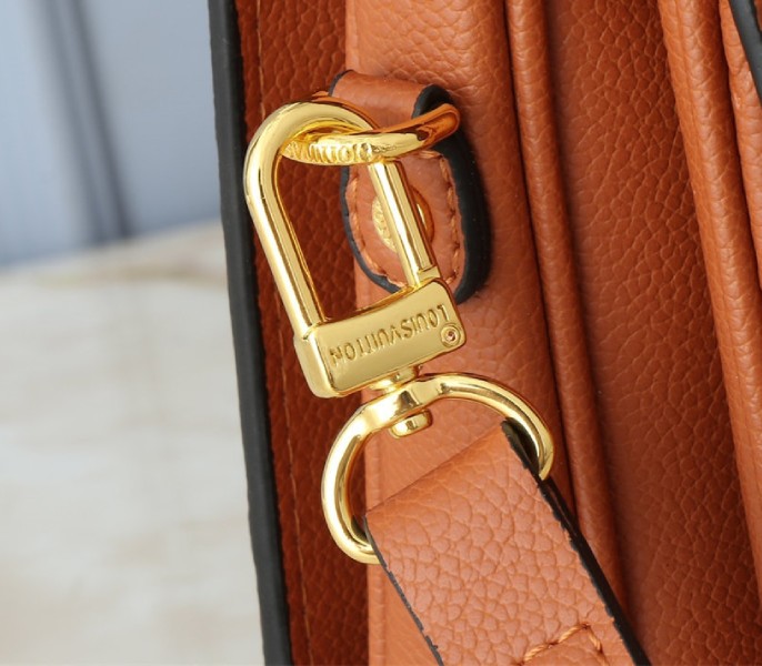 Louis Vuitton Monogram Empreinte Metis Handbag In Cognac Brown