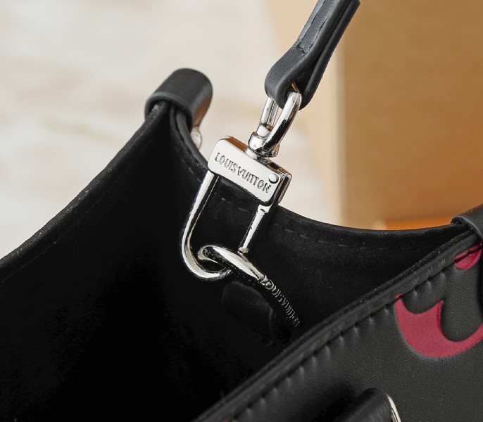 Monogram Empreinte OnTheGo PM Tote In Black And Magenta Pink