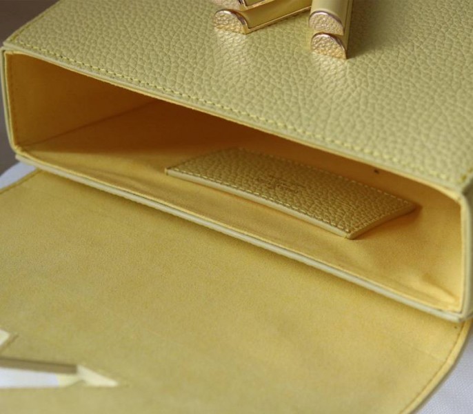 Louis Vuitton Taurillon Leather Twist MM Scrunchie Handle In Ginger Yellow