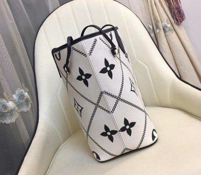 Louis Vuitton Spring 2022 Monogram Empreinte Neverfull MM Tote In Cream