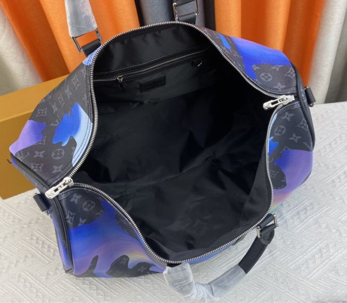 Louis Vuitton Monogram Eclipse Keepall 55 Bandouliere Travel Bag In Blue Sunrise