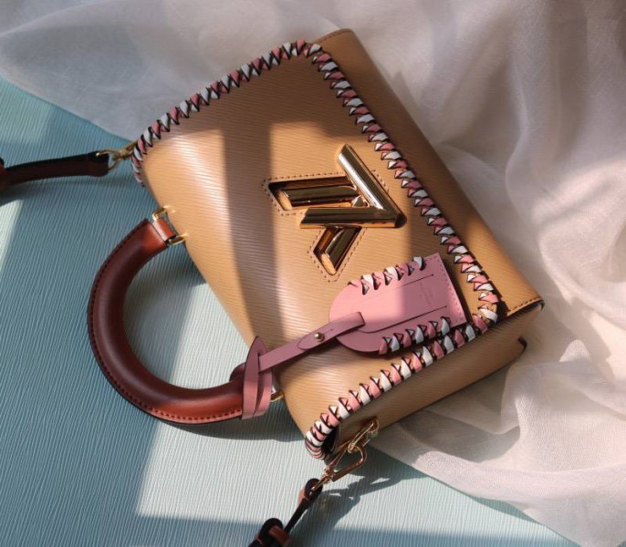 Louis Vuitton Epi Leather Twist MM Bag In Beige With Braided Edges Flap