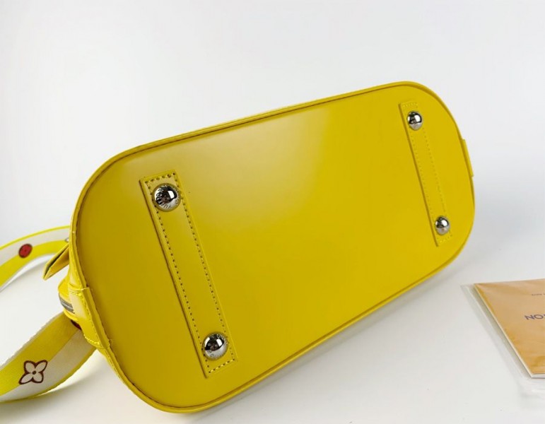 Louis Vuitton Epi Leather Alma PM Handbag In Cedrat Yellow With Jacquard Strap