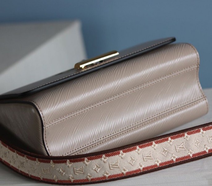 Louis Vuitton Epi Leather Twist MM Handbag In Galet Gray With Embroidered Strap
