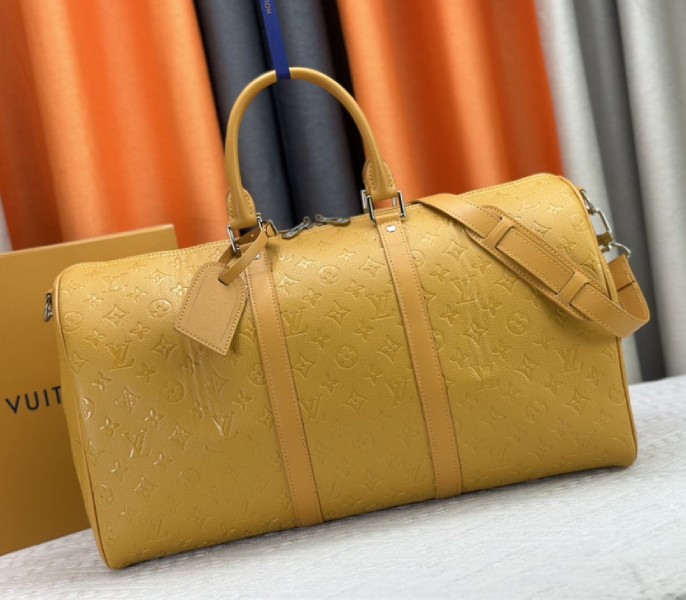 Louis Vuitton Taurillon Leather Keepall Bandouliere 50 In Safran Yellow