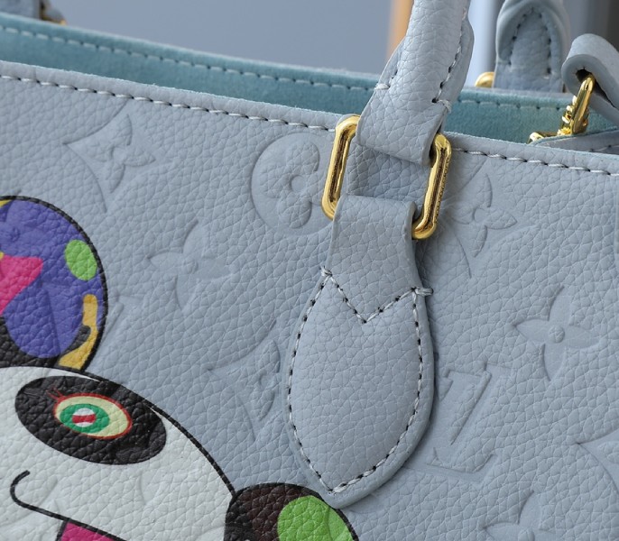 X TM Monogram Empreinte OnTheGo PM With Bijou Edition In Washed Blue