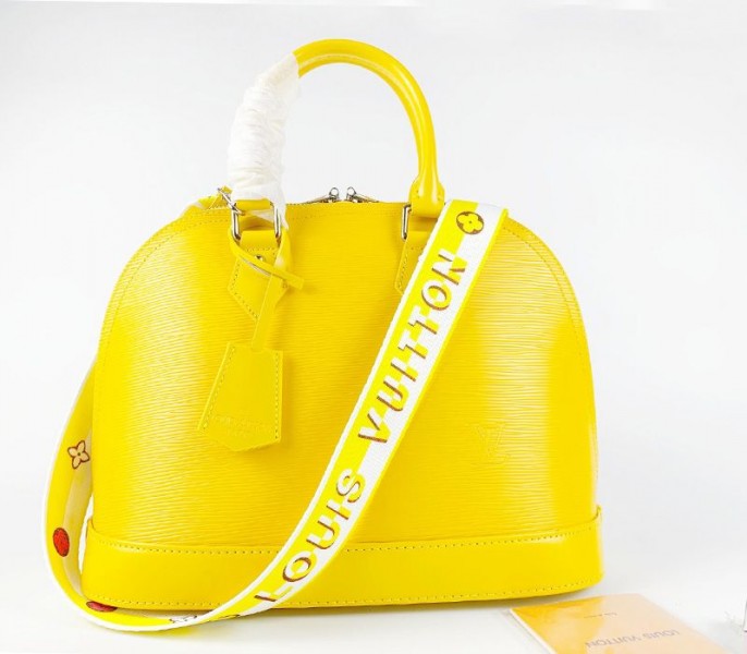 Louis Vuitton Epi Leather Alma PM Handbag In Cedrat Yellow With Jacquard Strap