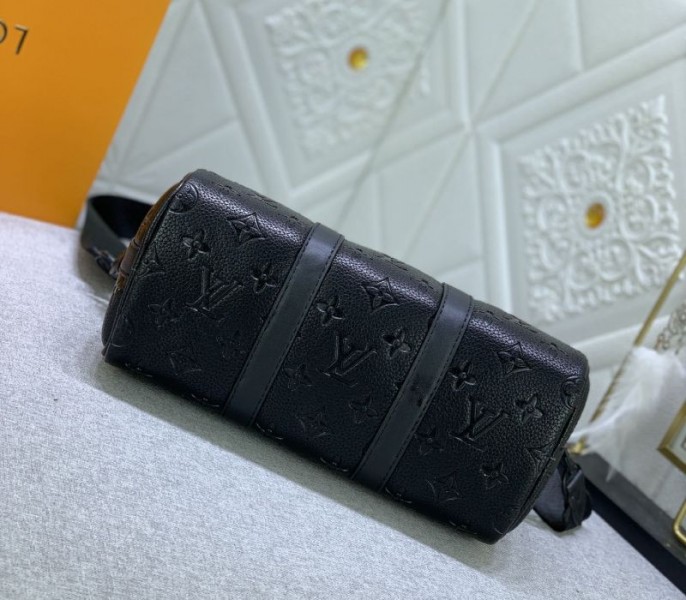 Louis Vuitton Taurillon Monogram Leather Keepall Bandouliere 25 In Black