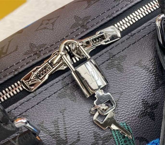 Louis Vuitton X YK Monogram Eclipse Reverse Keepall 45 Luggage In Pumpkin