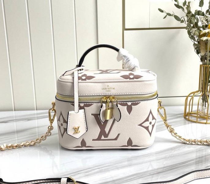 Louis Vuitton Bicolor Monogram Empreinte Vanity PM Bag In Cream And Bois De Rose Pink