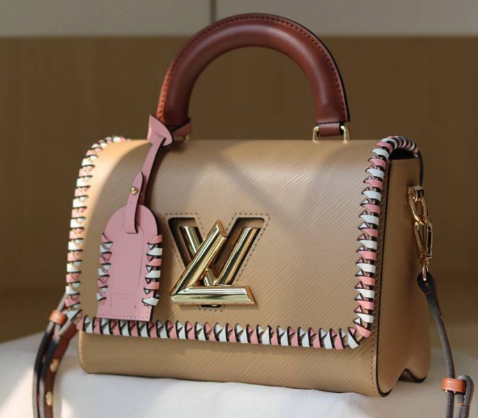 Louis Vuitton Epi Leather Twist MM Bag In Beige With Braided Edges Flap