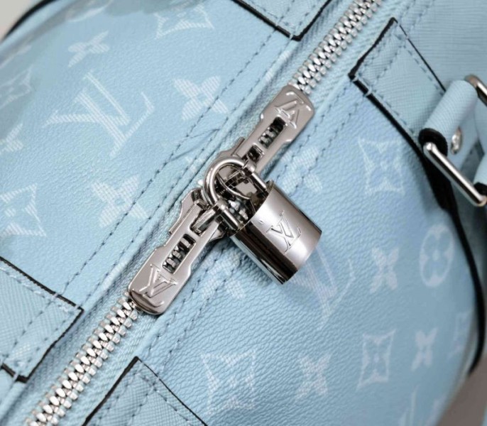 Louis Vuitton Taiga Leather Keepall Bandouliere 50 Travel Bag In Miami Green