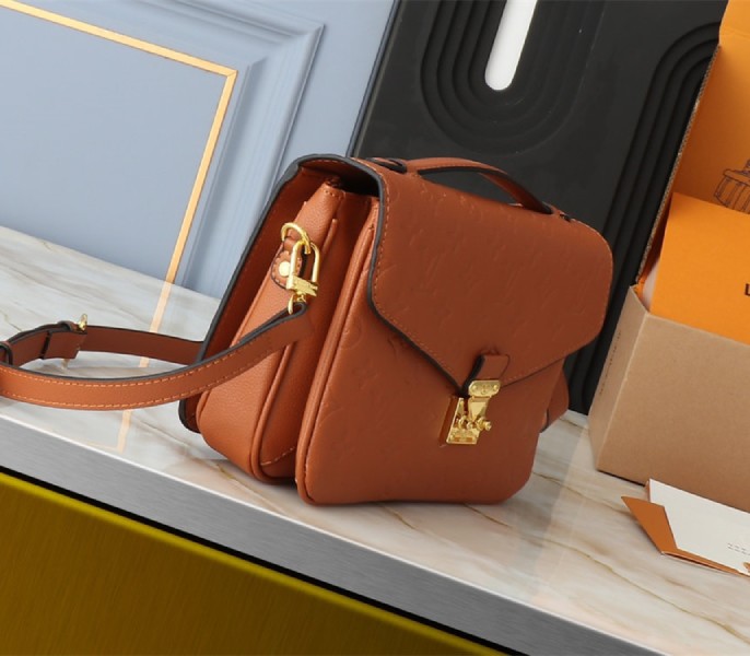 Louis Vuitton Monogram Empreinte Metis Handbag In Cognac Brown