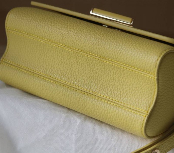 Louis Vuitton Taurillon Leather Twist MM Scrunchie Handle In Ginger Yellow