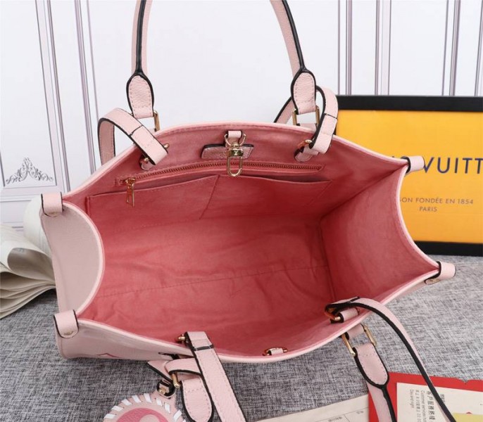 Louis Vuitton Monogram Empreinte Leather Onthego MM Bag In Pink