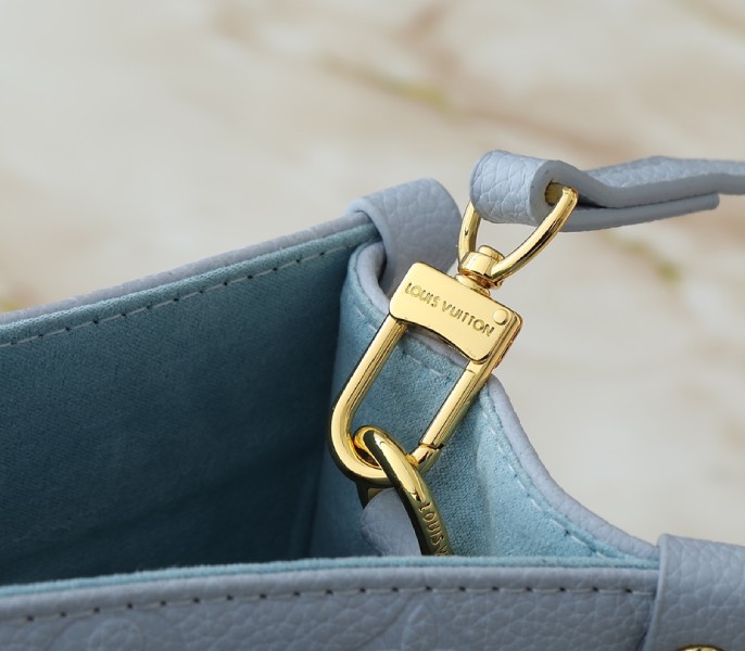 X TM Monogram Empreinte OnTheGo PM With Bijou Edition In Washed Blue