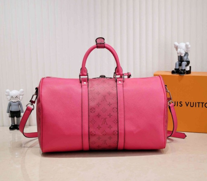 Louis Vuitton Taiga Leather Keepall Bandouliere 50 Travel Bag In Pink