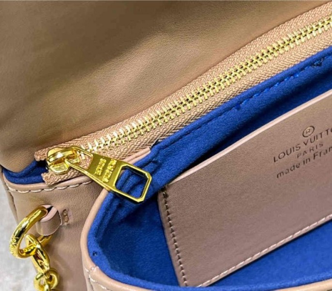 Louis Vuitton Coussin Pochette In Camel