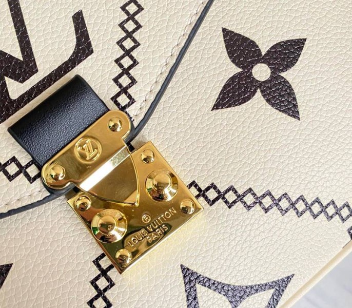 Louis Vuitton Spring 2022 Monogram Empreinte Pochette Metis Handbag In Cream