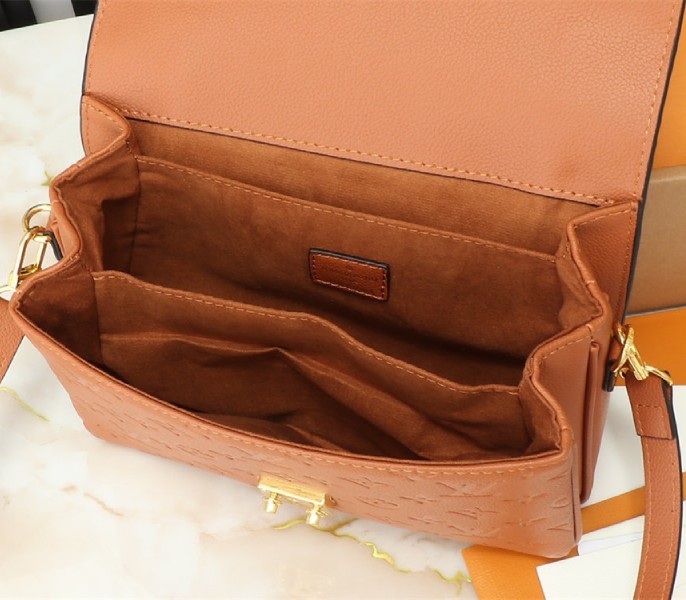 Louis Vuitton Monogram Empreinte Metis Handbag In Cognac Brown