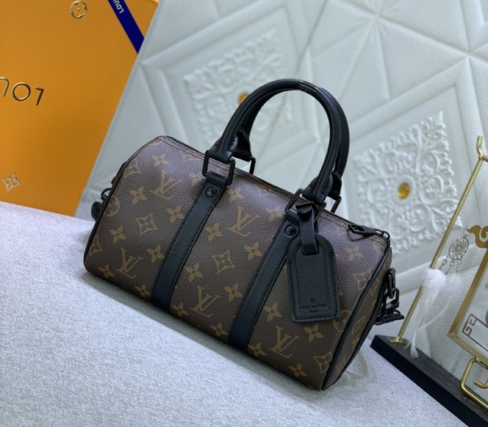 Louis Vuitton Monogram Canvas Keepall Bandouliere 25 In Black