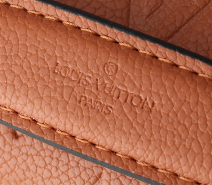 Louis Vuitton Monogram Empreinte Metis Handbag In Cognac Brown