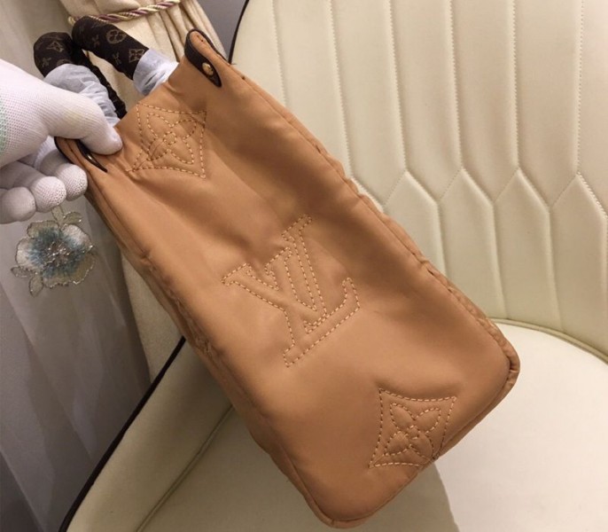 Louis Vuitton Econyl Regenerated Nylon Onthego GM Tote In Beige
